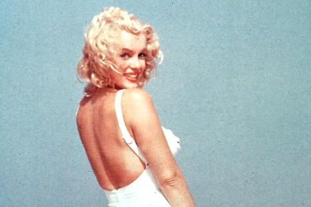 Mit ihrem verführerischen Lächeln, den blonden Locken und dem kurvigen Körper machte sie die Männerwelt verrückt: Marilyn Mo...