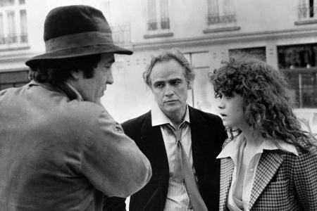 Bernardo Bertolucci (l.) mit Marlon Brando und Maria Schneider bei den Dreharbeiten von 