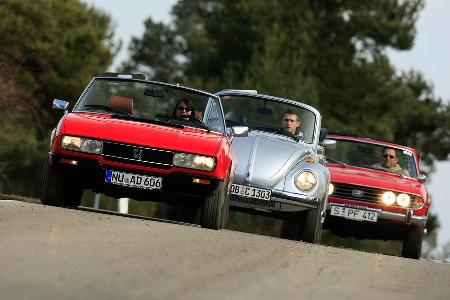 Peugeot 504 Cabriolet, Triumph Stag, VW 1303 Cabriolet Frontansicht