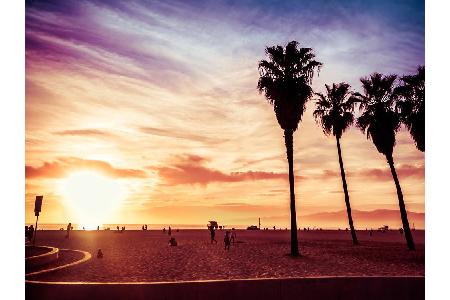 ... ist der Venice Beach in Los Angeles. An der Pazifikküste Kaliforniens sind die Sonnenuntergänge die heimlichen Stars, wi...