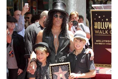Saul Hudson, besser bekannt als Guns N' Roses-Gitarrist Slash entschied sich für eine Weltstadt: Sein Sohn (15, rechts im Bi...
