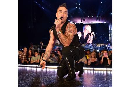 ...der geborene Entertainer Robbie Williams hat Take That schließlich bereits 1995 verlassen und seither eine beeindruckende...