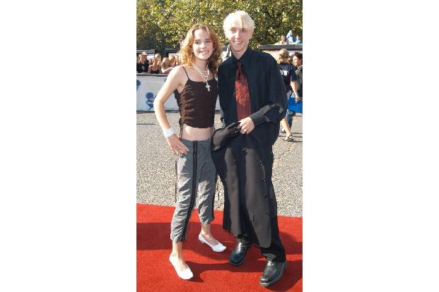 ...sah der kleine Tom alias Draco Malfoy zu Beginn seiner Karriere aus. Hier posiert er mit seiner Kollegin Emma Watson. Ohn...