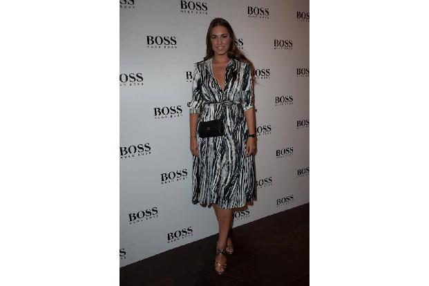 Eine etwas weniger elegante, aber genauso bezaubernde Version des Schwarz&Weiß-Looks trug Amber Le Bon zur Hugo Boss Bootsta...