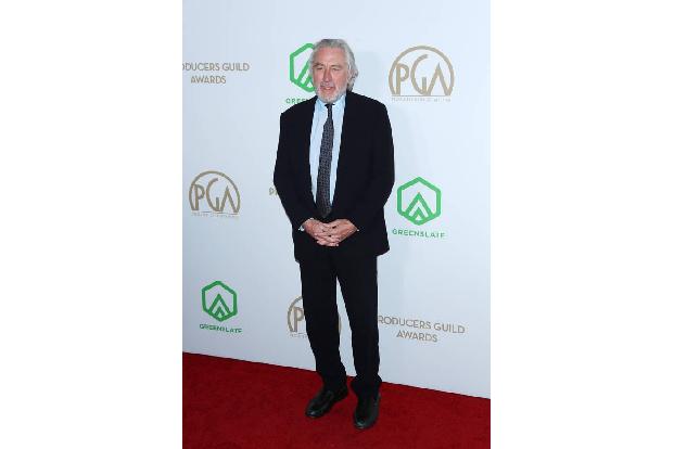 ...Robert De Niro ließ sich auch blicken, war aber wie immer nicht nur modisch eher zurückhaltend, sondern auch stimmungsmäß...
