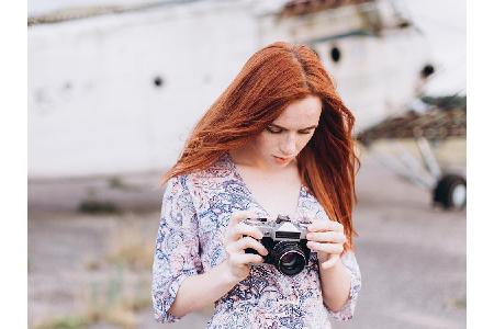 Für die Tinder-Männer sind Fotografinnen besonders anziehend. Der kreative Beruf landet auf Platz fünf.