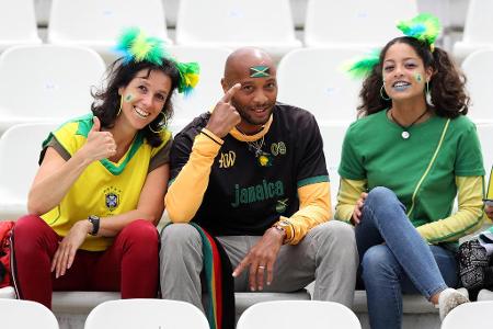 Dieses illustre Trio trägt zwar die gleichen Farben, unterstützt mit Brasilien und Jamaika aber unterschiedliche Mannschaften.