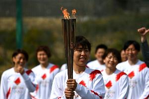 "Nie die Hoffnung verloren": Olympischer Fackellauf beginnt in Fukushima ohne Zuschauer