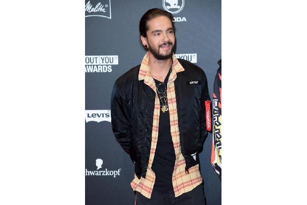 ...Tom Kaulitz, der mit seinem Bruder Bill im Oktober 2010 nach Los Angeles gezogen war. In Deutschland hatten sie mit ihrer...