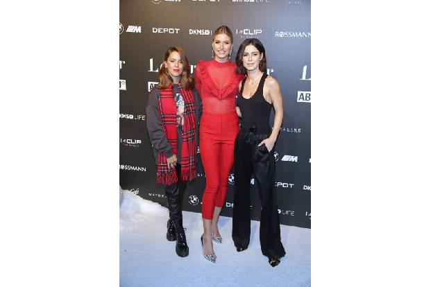 ...Lena Meyer-Landrut kannte hingegen keinen Schmerz und erschien nur leicht bekleidet auf dem Event in einem schwarzen Top....