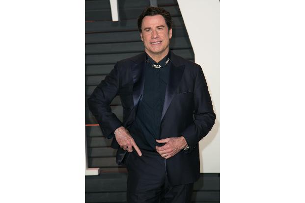 05 John Travolta Brian To WENn wenn22230987.jpg