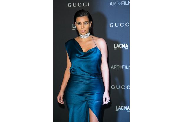 09 Kim Kardashian Brian To WENN wenn21883536.jpg