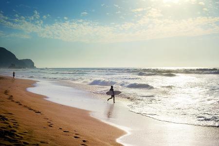 Portugal Algrave surfer getty images.jpg