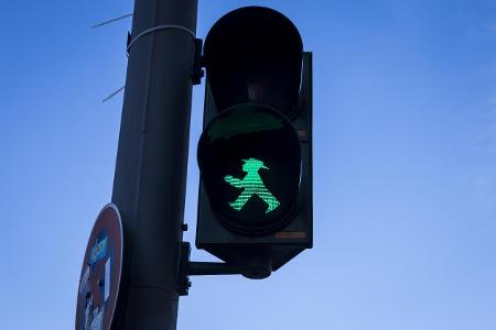 Green Ampelmann on a pedestrian crossing in Berlin, Germany....