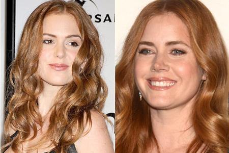 Die rote Lockenmähne ist ihr Markenzeichen: Isla Fisher (li.) und Amy Adams werden auf dem roten Teppich gerne mal verwechselt.