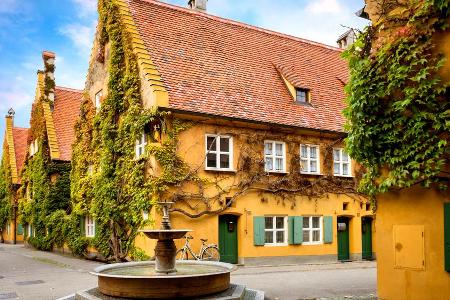 Die Fuggerei in Augsburg wurde 1521 von dem Kaufmann Jakob Fugger (1459-1525) gestiftet.