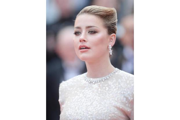 Amber Heard sah selten so betörend schön aus wie am Mittwoch, als sie den Filmfestspielen beiwohnte, um sich die Premiere de... Amber Heard sah selten so betörend schön aus wie am Mittwoch, als sie den Filmfestspielen beiwohnte, um sich die Premiere de...
