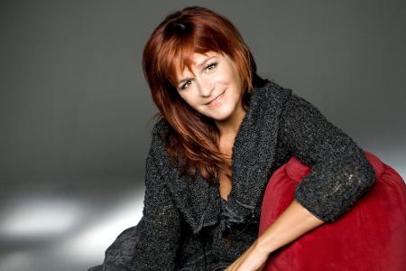 Die roten Haare sind Andrea Bergs Markenzeichen