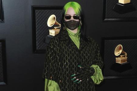 Sängerin Billie Eilish (18) war die große Abräumerin des Abends - und in ihrer eigenwilligen Gucci-Kombination in den Farben...