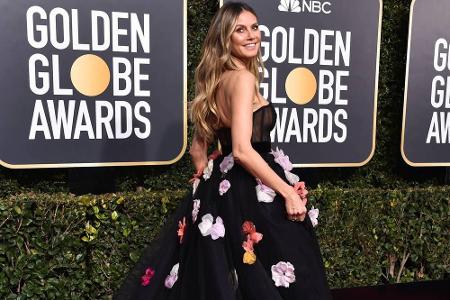 Entertainerin Heidi Klum strahlte in einem Kleid mit 3D-Blumen von Monique Lhuillier.