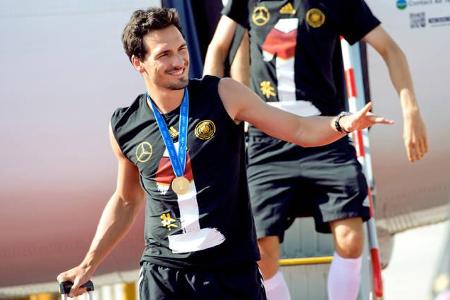 So sieht ein glücklicher Sieger aus: Als gestandene Weltmeister kehrte die Nationalmannschaft im Juli 2014 nach Deutschland ...