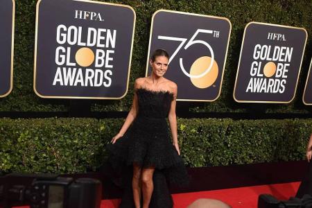 Model Heidi Klum trug bei den Golden Globes 2018 ein Kleid von Ashi Studio. Sie folgte dem Trend der Preisverleihung und ent...