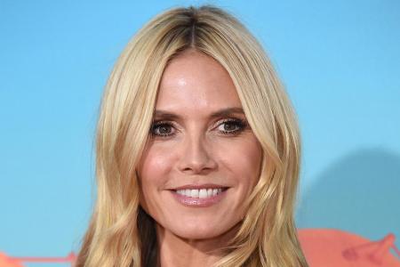 Supermodel Heidi Klum zeigt gerne ihre weißen Zähne.
