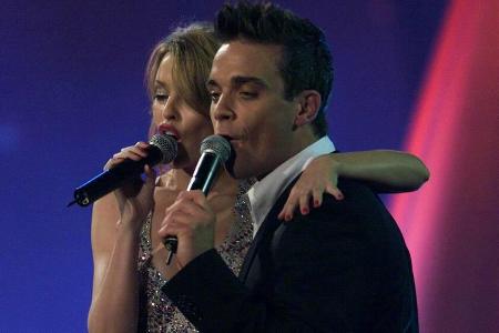 Kylie Minogue und Robbie Williams im Jahr 2000 bei einem gemeinsamen Auftritt Kylie Minogue und Robbie Williams im Jahr 2000 bei einem gemeinsamen Auftritt