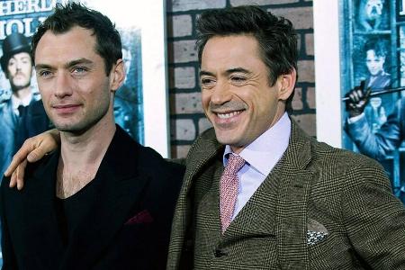 Jude Law (li.) und Robert Downey Jr. bei der 