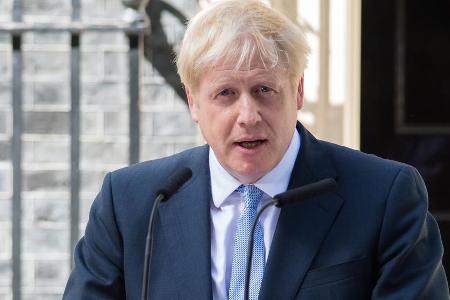 Boris Johnson hat sich zum Rückzug von Harry und Meghan geäußert. Boris Johnson hat sich zum Rückzug von Harry und Meghan geäußert.