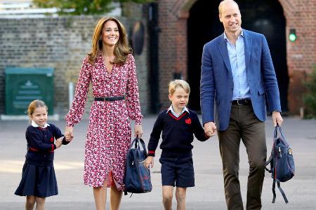 Herzogin Kate und Prinz William mit zwei ihrer drei Kinder, Prinzessin Charlotte (li.) und Prinz George