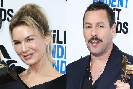 Renée Zellweger und Adam Sandler mit ihren Trophäen