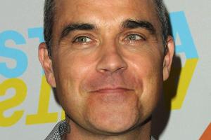 Sein Cover-Star: Robbie Williams ist stolz auf seine Tochter