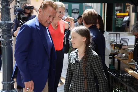 Greta Thunberg (r.) und Arnold Schwarzenegger trafen sich