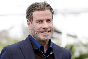 John Travolta startet mit einer Glatze ins neue Jahr