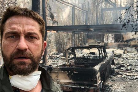 Gerard Butler vor seinem abgebrannten Haus