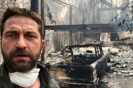 Gerard Butler vor seinem ausgebrannten Haus