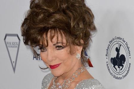 Joan Collins pflegt eine skurrile Beziehung zu einer Fliege Joan Collins pflegt eine skurrile Beziehung zu einer Fliege