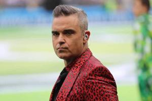 Robbie Williams und der WM-Auftakt: Was kostet ihn sein Stinkefinger?