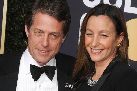 Hugh Grant und seine Freundin Anna Eberstein bei den Golden Globes 2018