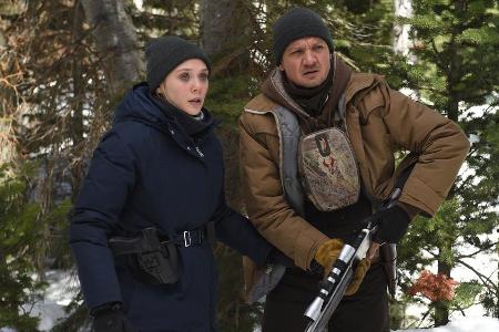 Jäger Cory Lambert (Jeremy Renner) und FBI-Agentin Jane Banner (Elizabeth Olsen) kämpfen sich gemeinsam durch einen komplizi...