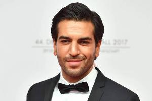 Elyas M'Barek zaubert Angela Merkel ein Lächeln ins Gesicht
