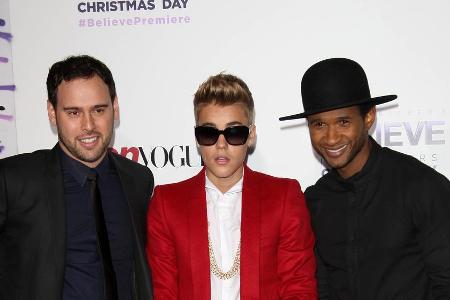 Kurz vor dem großen Sturm: Scooter Braun (li.) Ende 2013 mit Justin Bieber und Usher (re.) Kurz vor dem großen Sturm: Scooter Braun (li.) Ende 2013 mit Justin Bieber und Usher (re.)