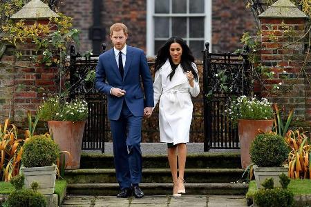 Ein Bild, das bleiben wird: Meghan Markle in weiß neben ihrem Verlobten Prinz Harry