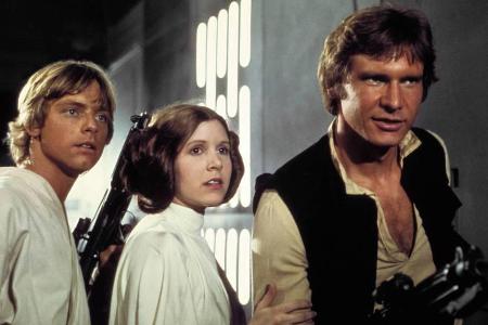 Harrison Ford (r.) als Han Solo, Carrie Fisher als Prinzessin Leia und Mark Hamill als Luke Skywalker sind aus dem 