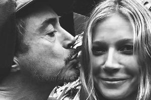 Gwyneth Paltrow und Robert Downey junior posen am Set