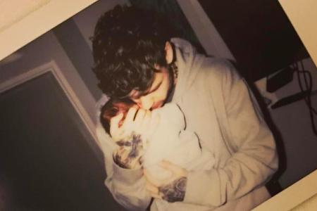 Liam Payne und Cheryl Cole posteten beide ein Foto des stolzen Vaters mit seinem neugeborenen Sohn