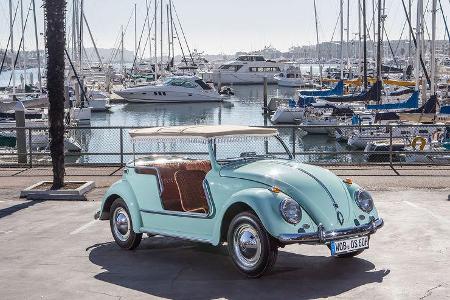 Korbmöbel, Sonnendach und umlaufende Reling sind eindeutige Strandwagen-Merkmale.