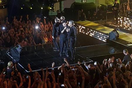 Die Fans flippen aus: Robbie Williams steht wieder mit Take That auf der Bühne