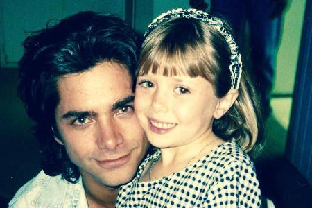 Schauspieler John Stamos und die kleine Elizabeth Olsen Anfang der Neunziger Jahre